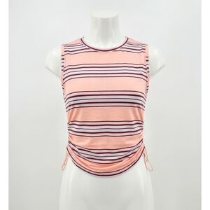 NEW FREE PEOPLE movement sport mode muscle tee in pastel peach combo